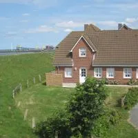 Direkt am Deich - Ferienwohnung Amrum im Gästehaus Am Badedeich, hotel Dagebüllben