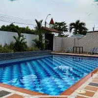 Aguamarina Inn - Casa de descanso con piscina - Tauramena Casanare, хотел в Tauramena