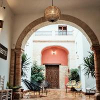 FRENTEABASTOS Suites Cafe Hostal & Apartments