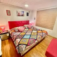 Habitacion Deluxe, Wi-Fi, desayuno gratis y a minutos del crucero!, hotel a San Antonio