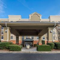 a building with a pavilion in front of a building at Comfort Suites near Birkdale Village - Huntersville