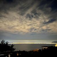 a view of the ocean with a cloudy sky at Hotel Victoria Place, Anacapri