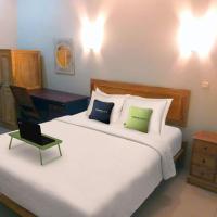 Urbanview Hotel Wayan Mansion، فندق في Renon، دينباسار