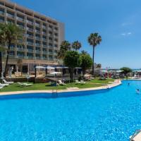 a large swimming pool in front of a hotel at Medplaya Hotel Pez Espada, Torremolinos