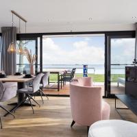 Houseboat 'de Valreep' met tuin, hotel in Offingawier