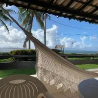 Apart-Hotel Beira Mar em Mar Grande - Vera Cruz - Ilha de Itaparica، فندق في فيرا كروز دو إيتاباريكا
