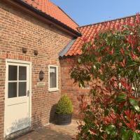 Meals Farm Holiday Cottages - The Granary, hotel a North Somercotes