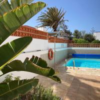 Beach house with the heated pool next to Rocky Point