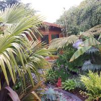 cabin set in a beautiful romantic tropical garden, hotel in Sutton Coldfield