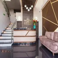 Hotel Basan Plaza، فندق في باستو