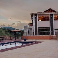 MANANCIAL HOTEL E EVENTOS, hotel i nærheden af Elias Breder Airport - JMA, Manhuaçu