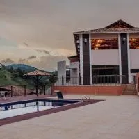 MANANCIAL HOTEL E EVENTOS، فندق في مانهواسو