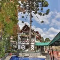 Le Suisse Elegance Hotel، فندق في كامبوس دو جورداو