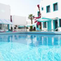 a large swimming pool in front of a building at Casa Aria Hotel, Gümbet