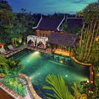 an overhead view of a swimming pool in front of a house at Villa Indochine D'angkor, Siem Reap