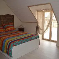 Escale à Villeperdue chambre JÜRMALA – hotel w mieście Saint-Épain