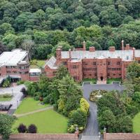 an aerial view of a large brick building at Abbey House Hotel, Barrow in Furness