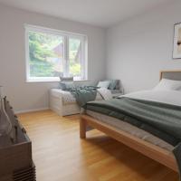 a bedroom with a large bed and a window at 3 room apartment, Hybe