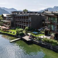 an aerial view of a resort on a river at Seevilla Freiberg, Zell am See