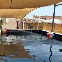 7 Shells RAK Holiday Home, hotel in Ras al Khaimah