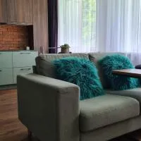 Mona Apartamentai โรงแรมในเตลเช