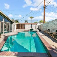 a swimming pool on top of a house at Privately Pool house four rooms with two bathrooms, Los Angeles