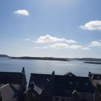 a view of a large body of water with houses at Sea View Cottage, 2 bedrooms with stunning views, Cobh
