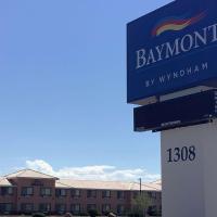 a sign for a building with a sign for a pharmacy at Baymont Inn & Suites by Wyndham Holbrook