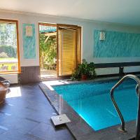 Spacious house with indoor pool & sauna., готель у місті Адажі