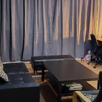 Double room in a cosy flat in Tooting, hotel i Tooting, London