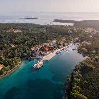 Apartments by the sea Molat - 18433, hotel in Molat