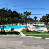 Apartamento até 10 pessoas na enseada Guarujá em condomínio clube praia piscinas salão jogos quadra futebol campo parquinho brinquedos Wi-fi Home office