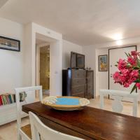 Charming Seafront Apartment with garden and patio