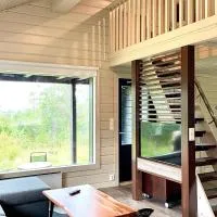 Hietavilla Pläk- Hot tube - Sauna - AC - Fireplace - 11kW EV-refuel - Landscape view - Silence - Free WiFi, hotel in Ruka
