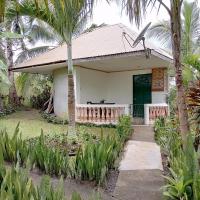 Jupiters Garden Cottages, hotel en Lawa-an