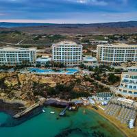 an aerial view of a resort and the ocean at Radisson Blu Resort & Spa, Malta Golden Sands, Mellieħa