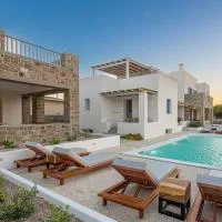 Manesis Suites, готель у місті Поллонія