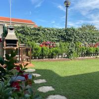 Bajo con jardín barbacoa y piscina comunitaria