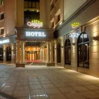 Grand Voyage Hotel، فندق في ألماتي