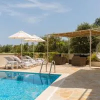 Villa Leveque - Kassiopi Sea View - 3 bedrooms、カシオピのホテル
