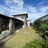 湘南ソラル〜二宮の高台・アートな庭付き日本家屋121㎡／高速WiFi／芝生ドッグラン・ピザ窯BBQ有, ξενοδοχείο σε Ninomiya