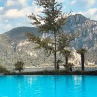 Schwimmbadferien am Luganersee, hotel v destinaci Bissone