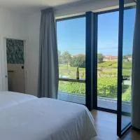 Ribadumia में, होटल Habitación deluxe rodeada de viñedos