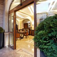 a lobby with large glass doors and potted plants at Best Western Plus Bristol Hotel, Sofia