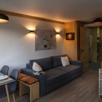 Courchevel 1550 - SUPERBE appartement SKIS AUX PIEDS !, מלון ב-Courchevel 1550, קורשבל