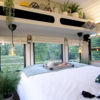 American School Bus Retreat with Hot Tub in Sussex Meadow