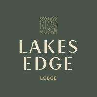 a logo for lakes edge lodge at Lakes Edge Lodge, Lake Tekapo