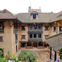 a large brick building with a courtyard in the middle at Newa Chen Historic House UNESCO, Pātan