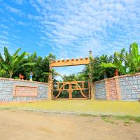 a gate to a playground in front of a house at SELVAMATHI FARM RESORTS, Salem