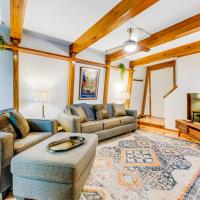 a living room with two couches and a tv at Hemlock Hideaway, Banner Elk